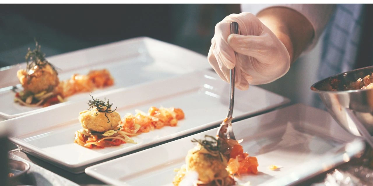 Private chef preparing an elevated in-home dining experience